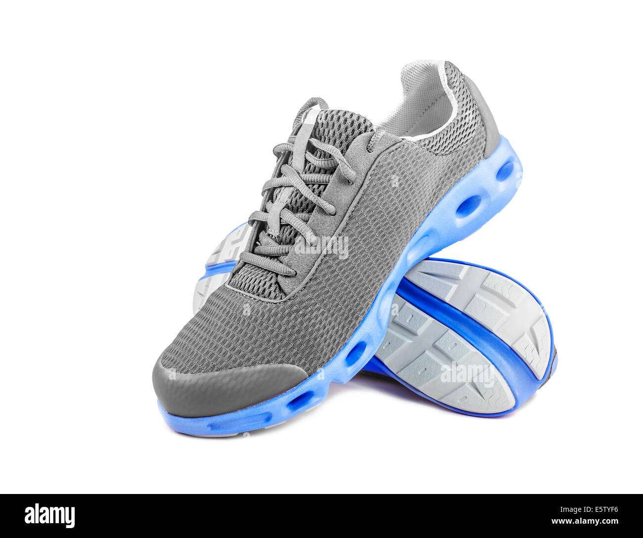New unbranded running shoes, sneakers or trainers on white Stock Photo