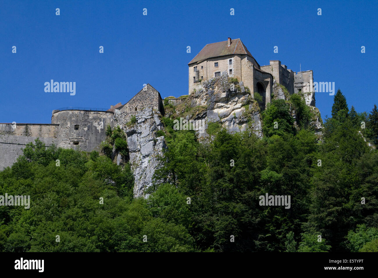 The 11th century fortified Joux castle perched on a rocky hills in Pontarlier, Doubs, Jura Mountains Stock Photo