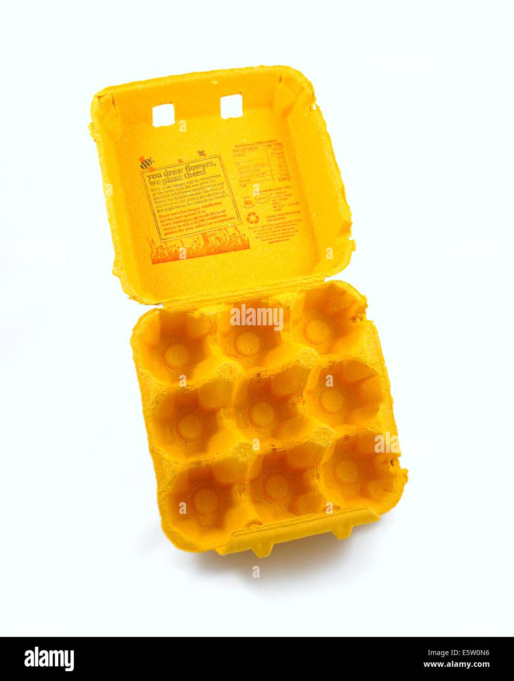 An empty yellow egg box Stock Photo