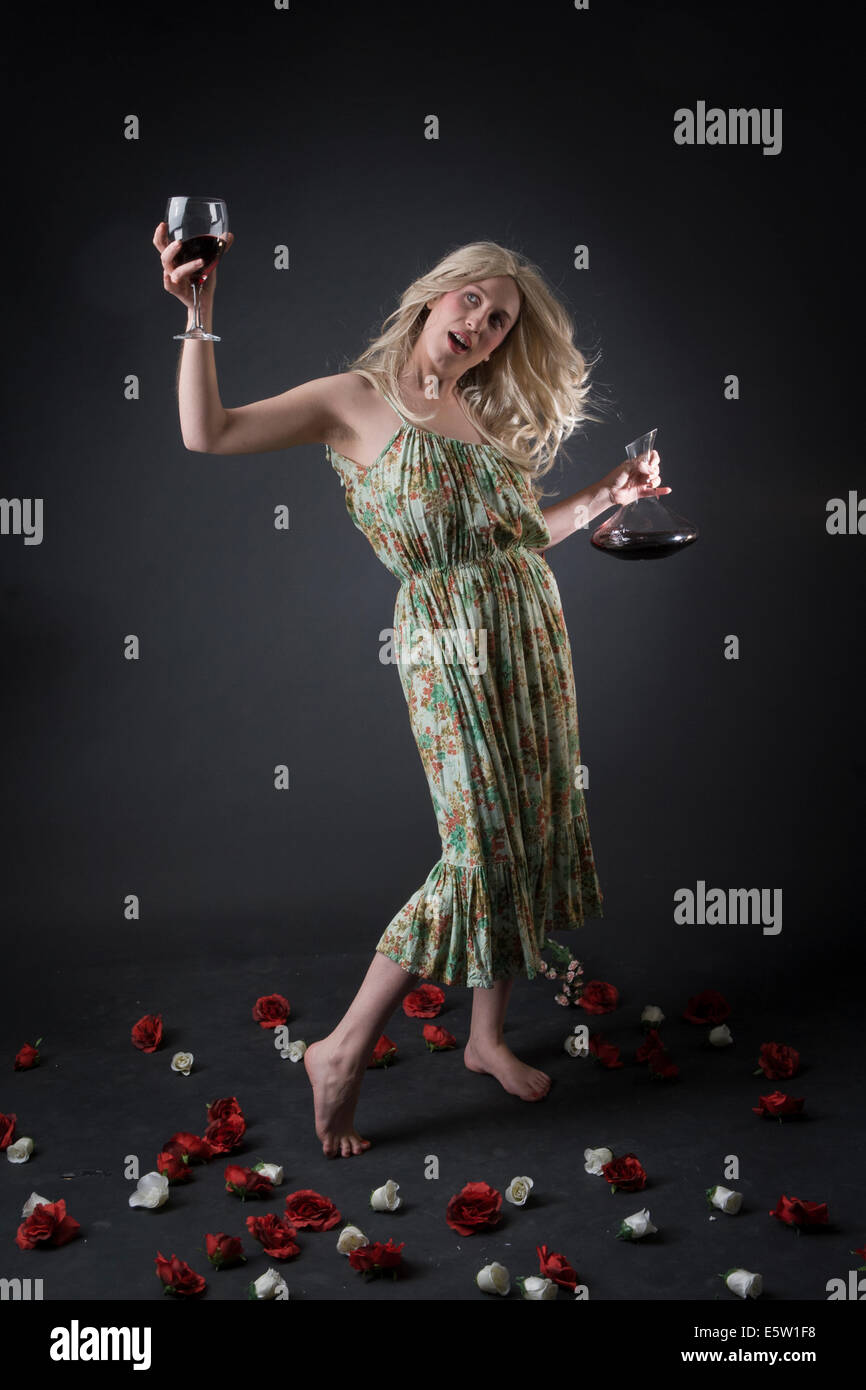 Cheerful girl toasting cup bottle hires stock photography and images
