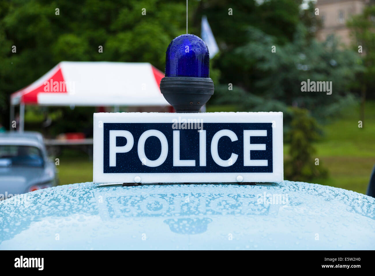 Police sign and blue light on top of a Morris Minor car Stock Photo Alamy