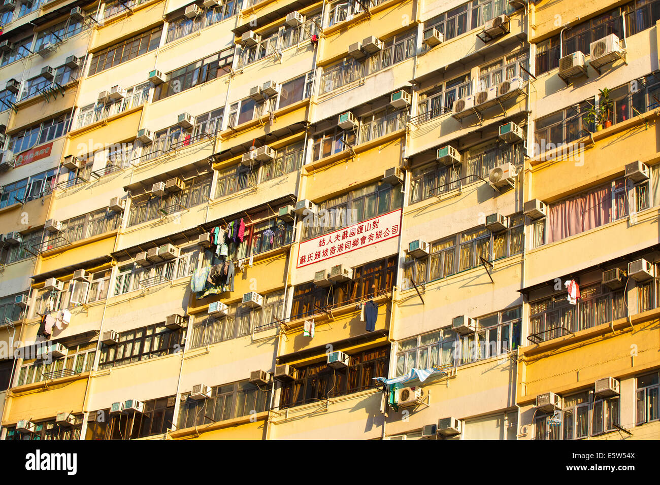 Bleak Vintage High Rise Building On Kings Road, Hong Kong. Stock Photo