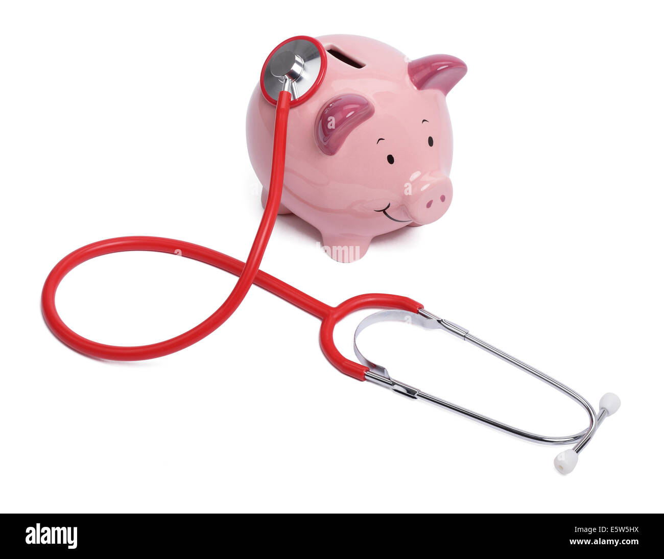 Pink piggy bank and a stethoscope Stock Photo