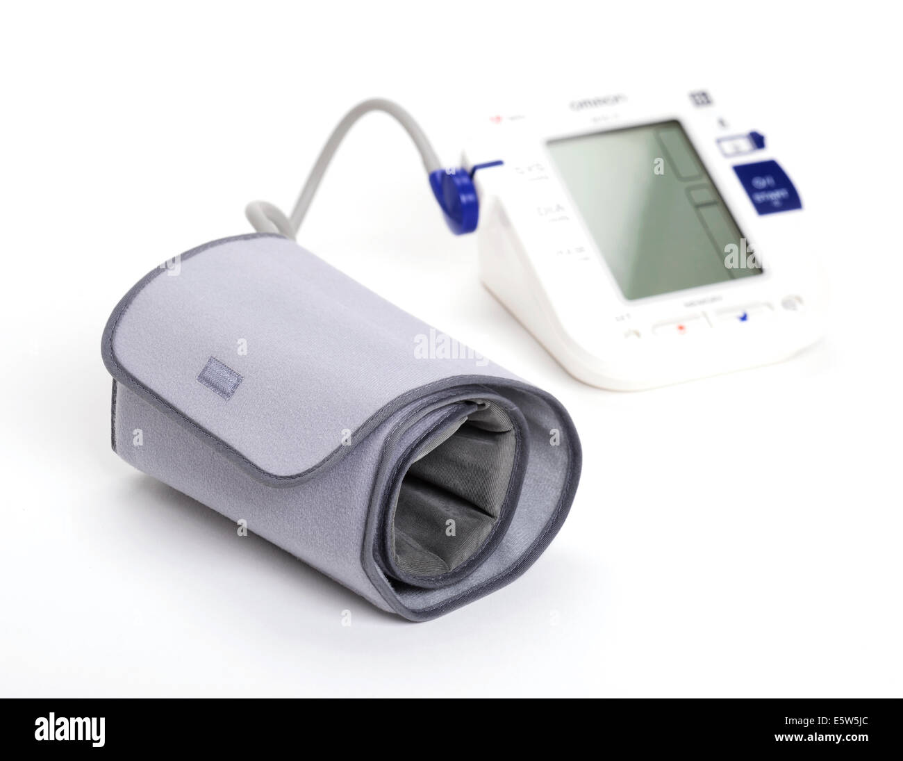 Omron blood pressure monitor with grey cuff Stock Photo