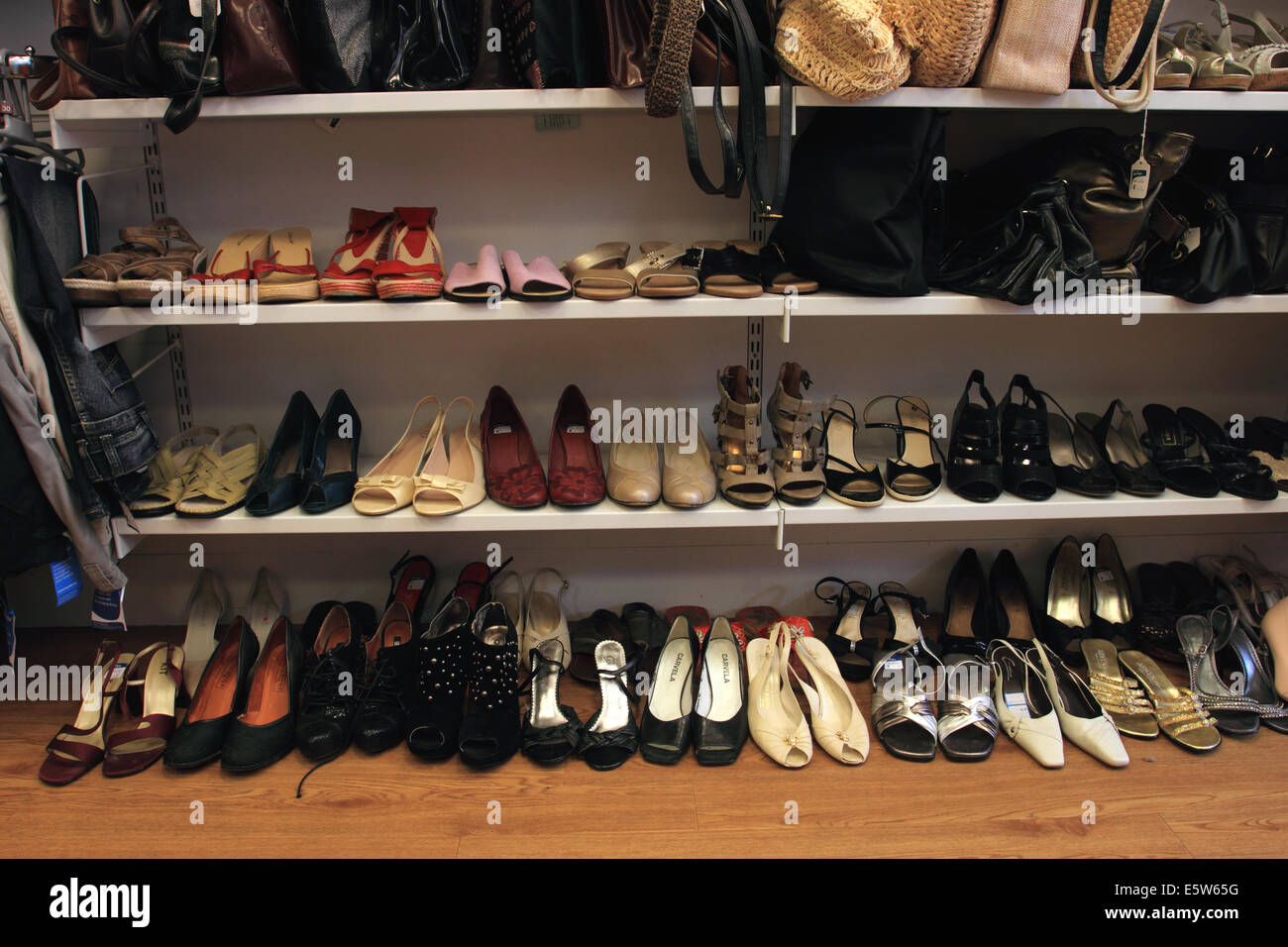 Second hand shoes on rack at charity shop hi-res stock photography and  images - Alamy