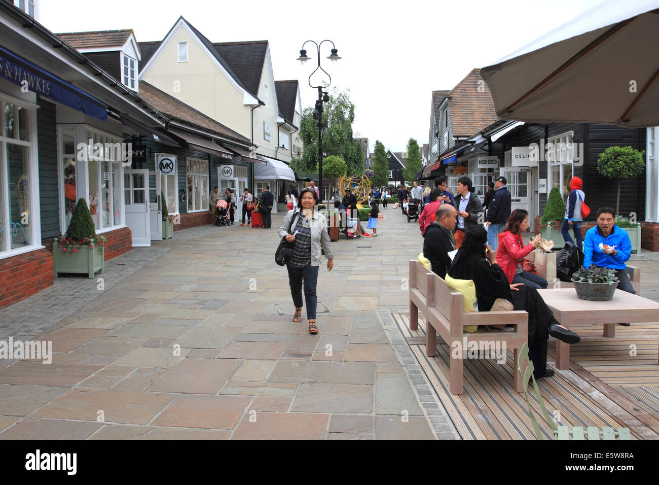 Bicester Village,brand name shops, Chinese shopping,resting,Bicester Oxford, UK Stock Photo