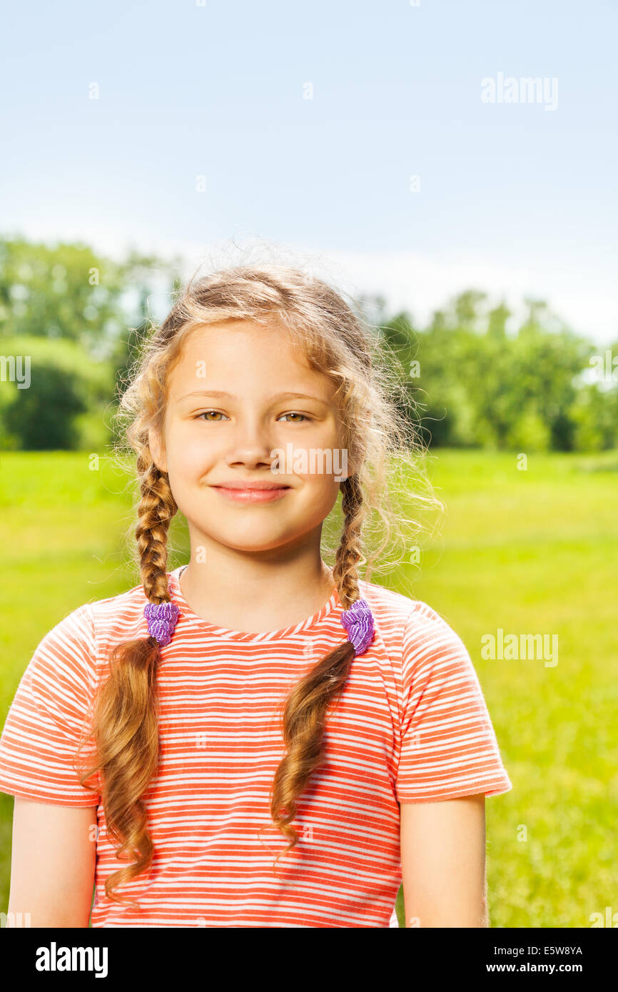 Portrait of pretty smiling girl with two braids Stock Photo - Alamy
