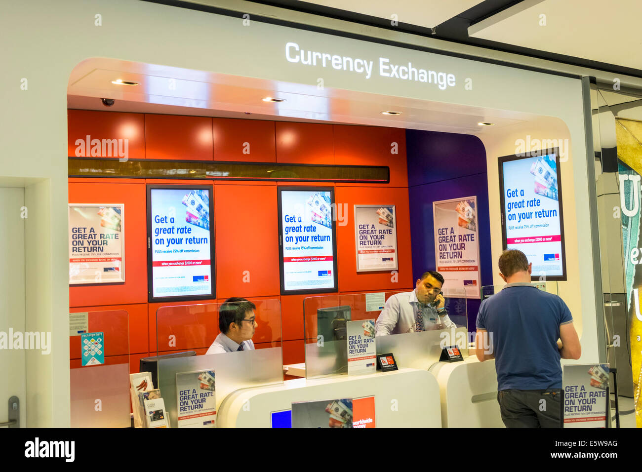 Sydney Australia,Kingsford-Smith Airport,SYD,interior inside,terminal,gate,Currency Exchange,money,counter,Asian man men male,customer,AU140323024 Stock Photo