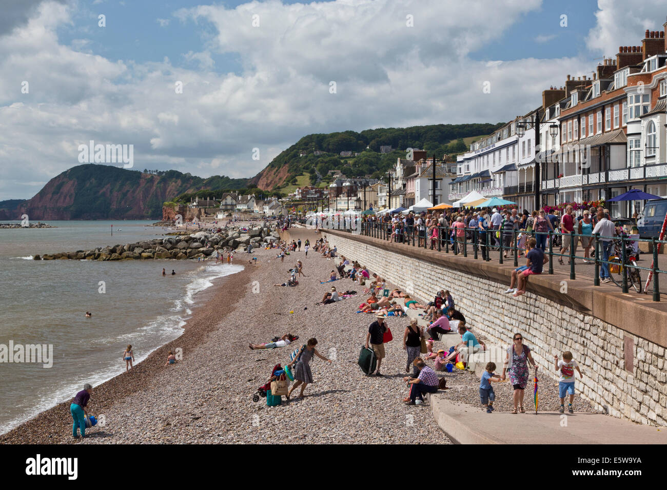 Sea front and beach at Sidmouth during folk festival 2014. Stock Photo