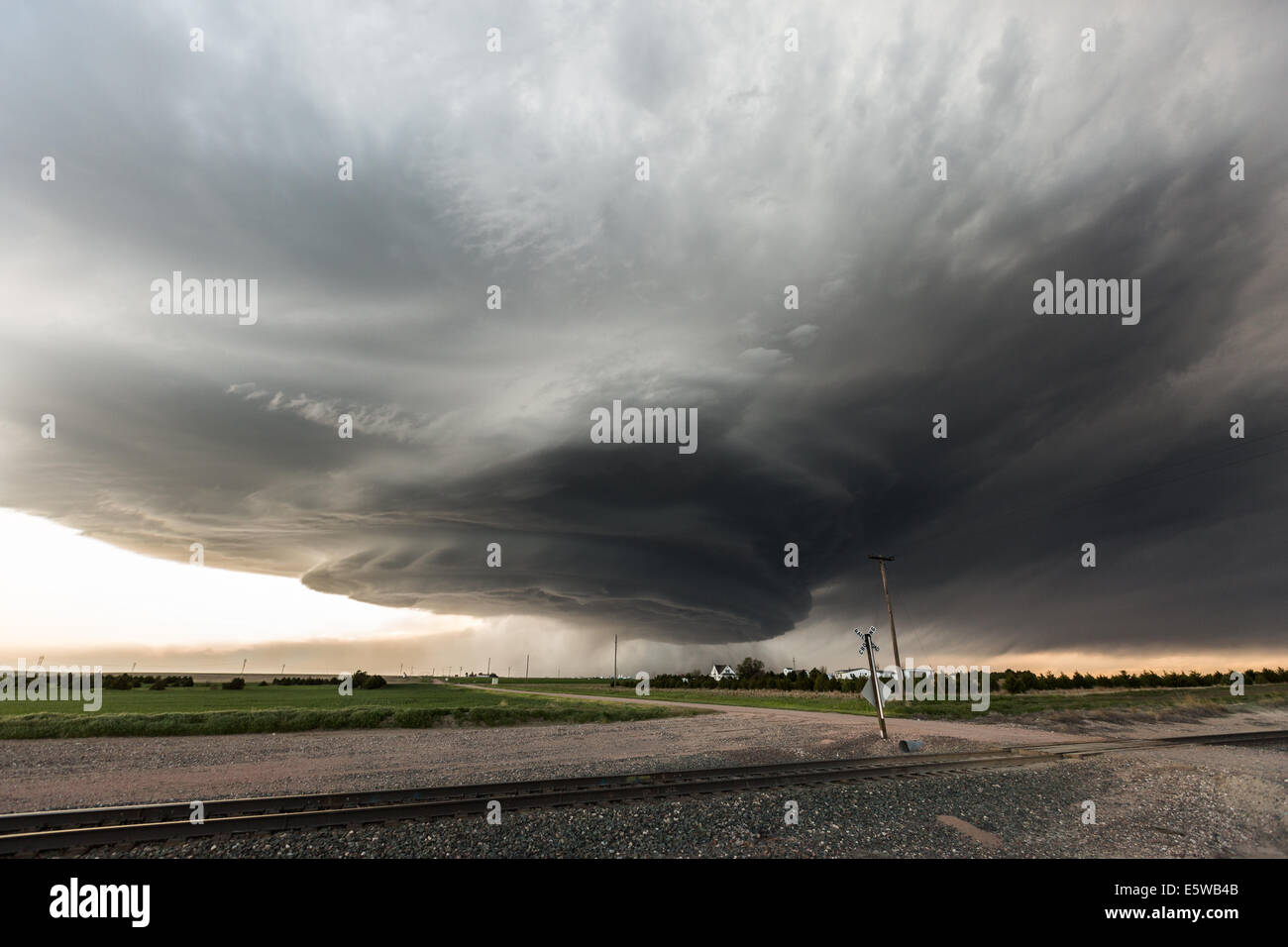 A classic high plains low precipitation supercell thunderstorm taking on a mothership striated appearance with hail fall streaks Stock Photo