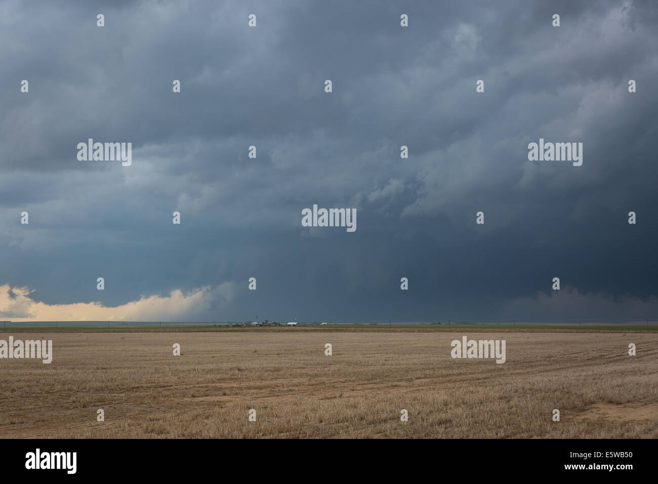 A tornado warned supercell thunderstorm rolls across the plains of ...