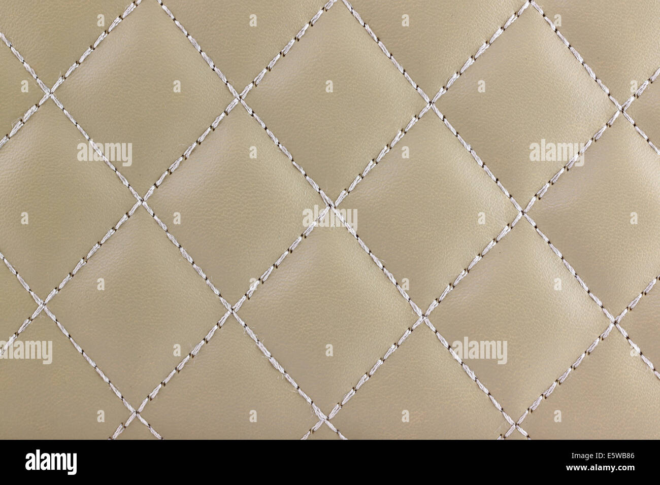 Textured and pattern of  light brown leather for the background. Stock Photo