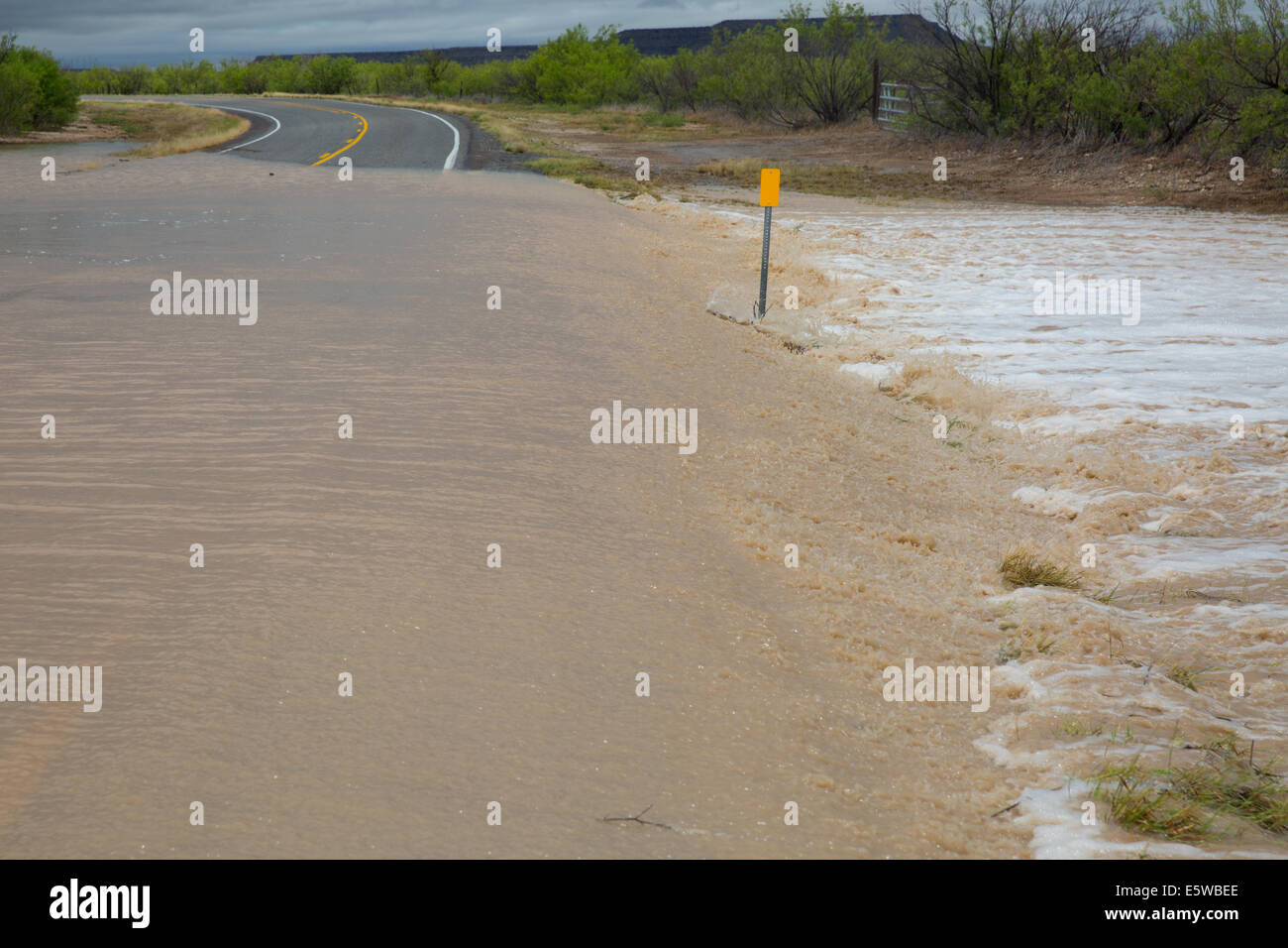 Sudden flash flooding dangerously overtakes a highway in Southern Texas