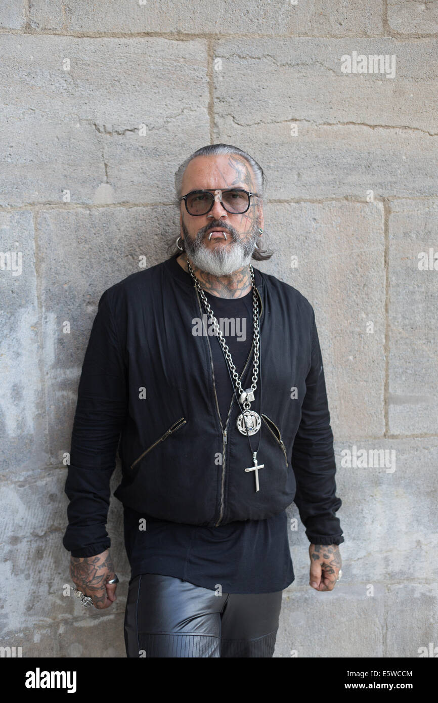 Berlin, Germany. 05th Aug, 2014. Berghain doorman Sven Marquardt poses at  Volksbuehne theater in Berlin, Germany, 05 August 2014. Berlin cult club  Berghain celebrates its ten year anniversary with an exhibition. Part