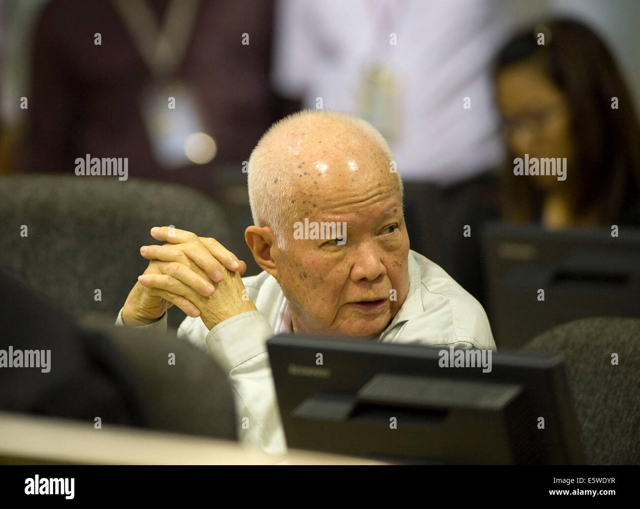 Phnom Penh, Cambodia. 7th Aug, 2014. Khieu Samphan, 83, former head of state of the Democratic Kampuchea, known as Khmer Rouge regime, appears in the courtroom in Phnom Penh, Cambodia, Aug. 7, 2014. The United Nations war crimes tribunal convicted two aging former top leaders of the Democratic Kampuchea, also known as Khmer Rouge, of atrocity crimes against humanity and sentenced them to life in prison, according to a verdict pronounced by the tribunal's president Nil Nonn on Thursday. Credit:  ECCC/Xinhua/Alamy Live News Stock Photo