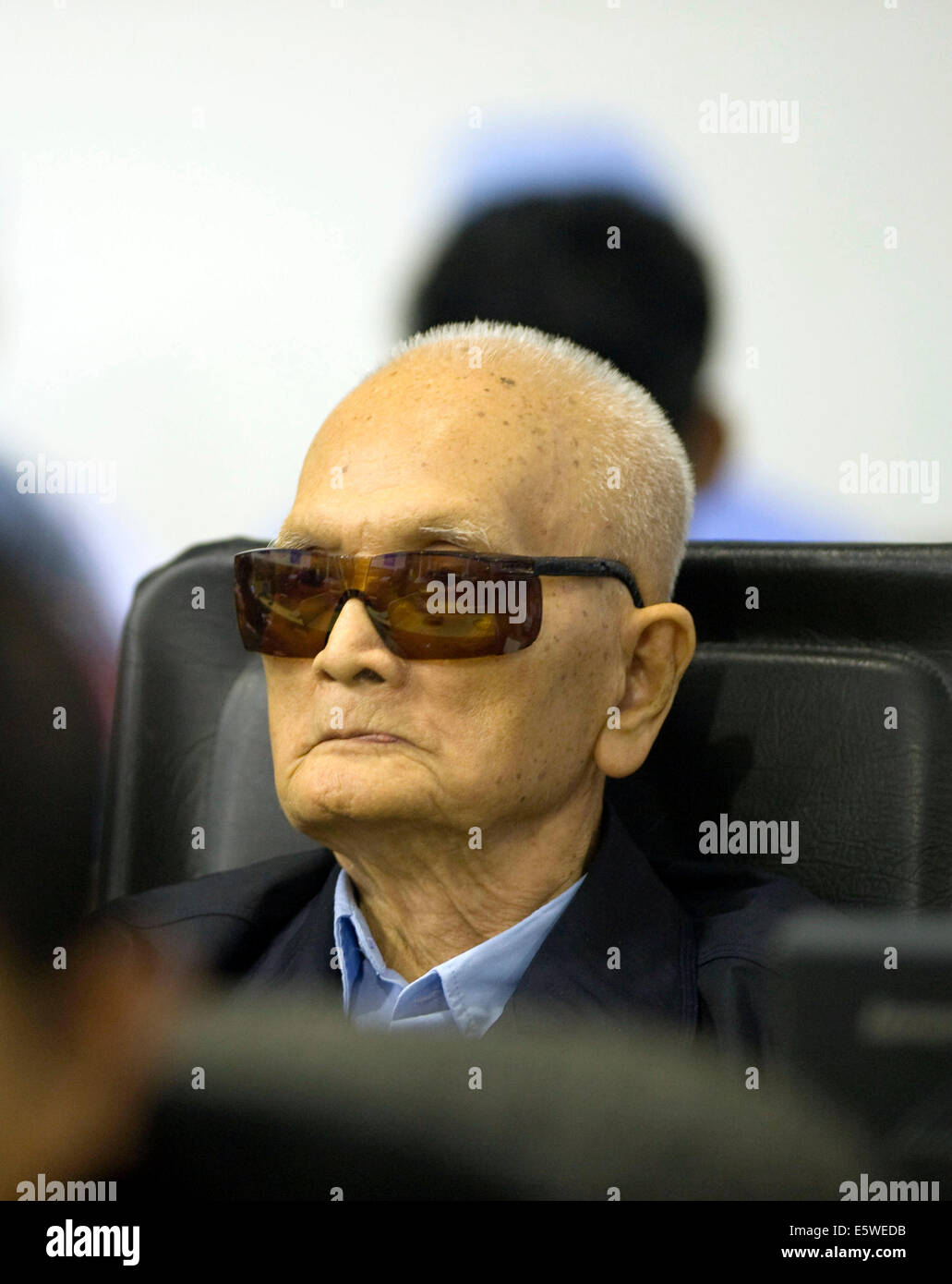 Phnom Penh, Cambodia. 7th Aug, 2014. Nuon Chea, 88, the chief ideologue of the Communist Party of Kampuchea, appears in the courtroom in Phnom Penh, Cambodia, Aug. 7, 2014. The United Nations war crimes tribunal convicted two aging former top leaders of the Democratic Kampuchea, also known as Khmer Rouge, of atrocity crimes against humanity and sentenced them to life in prison, according to a verdict pronounced by the tribunal's president Nil Nonn on Thursday. Credit:  ECCC/Xinhua/Alamy Live News Stock Photo