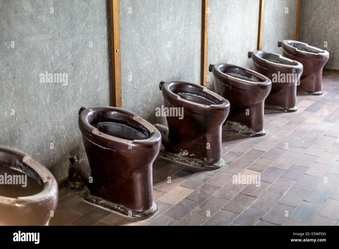 Toilets, reconstructed prisoner barracks, Dachau Concentration Camp