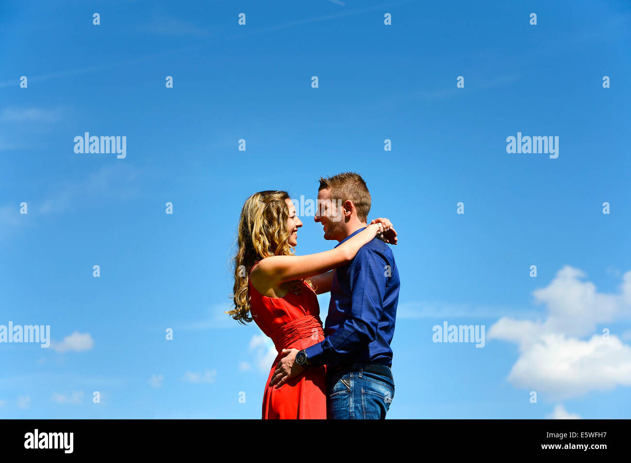 Lovers against a blue sky, Austria Stock Photo