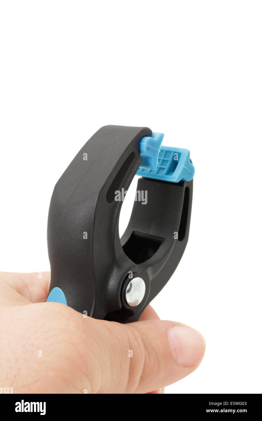 Hand holding plastic clamps Stock Photo Alamy