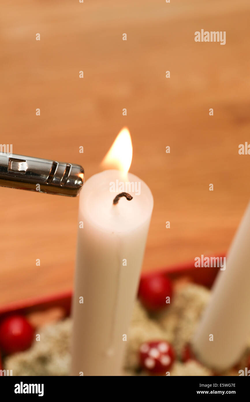Lightning a candle Stock Photo Alamy