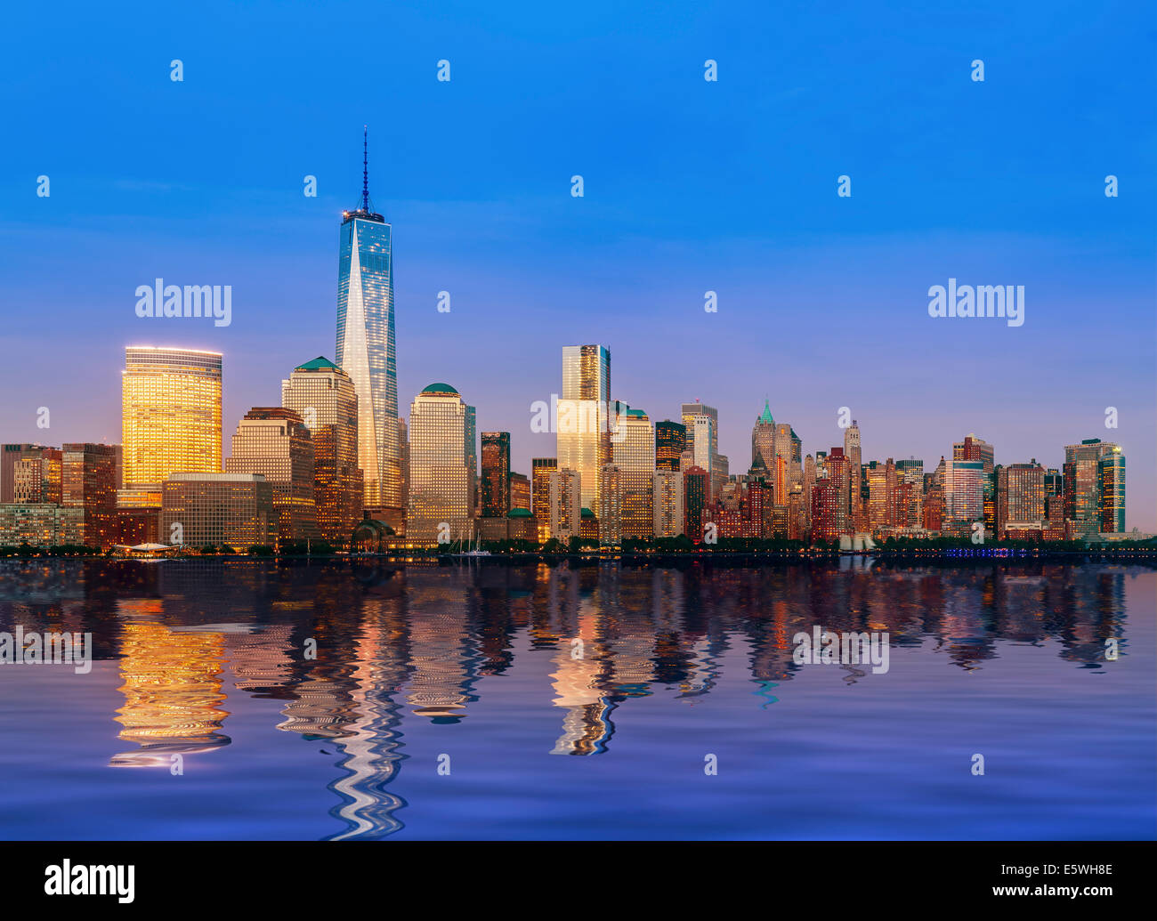 New York skyline of Lower Manhattan, New York City, USA with office block skyscrapers at evening dusk - 2013 Stock Photo