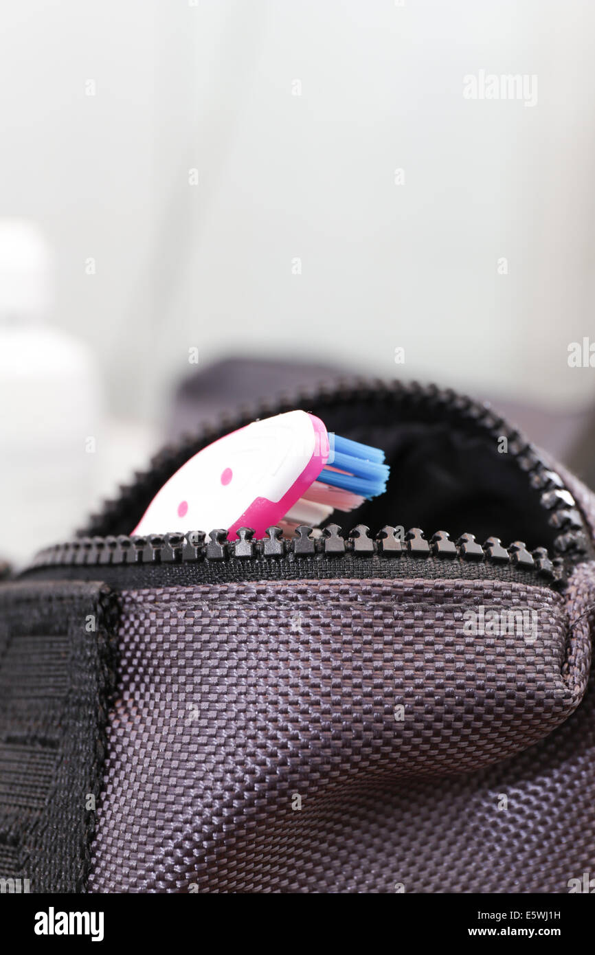 Toiletry bag with toothbrush Stock Photo Alamy