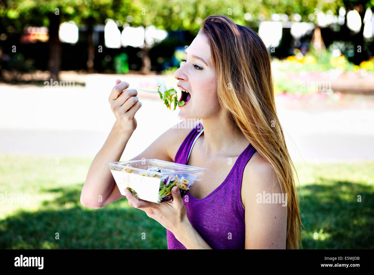 Woman eating a meal Stock Photo