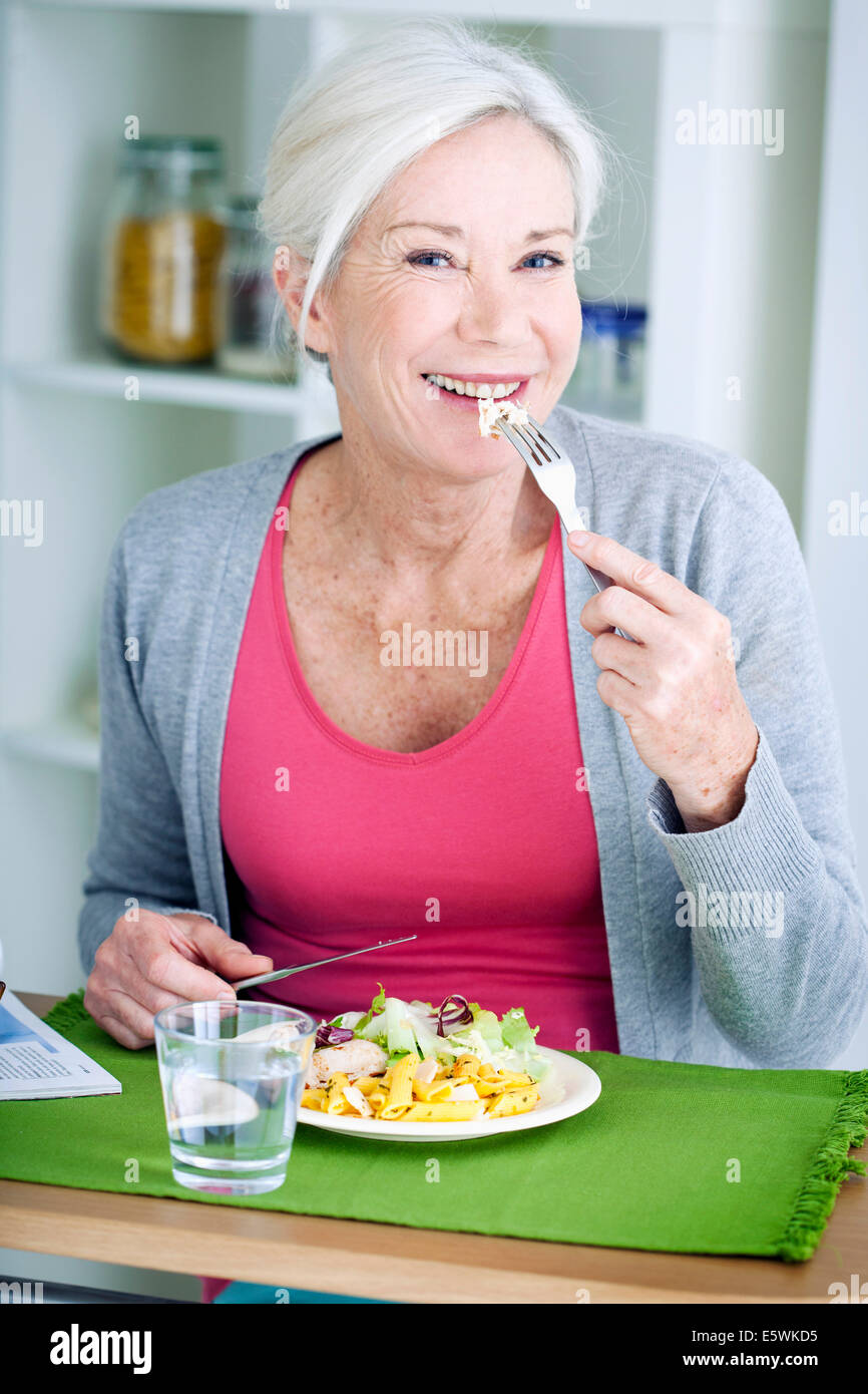 Elderly people eating a meal Stock Photo Alamy