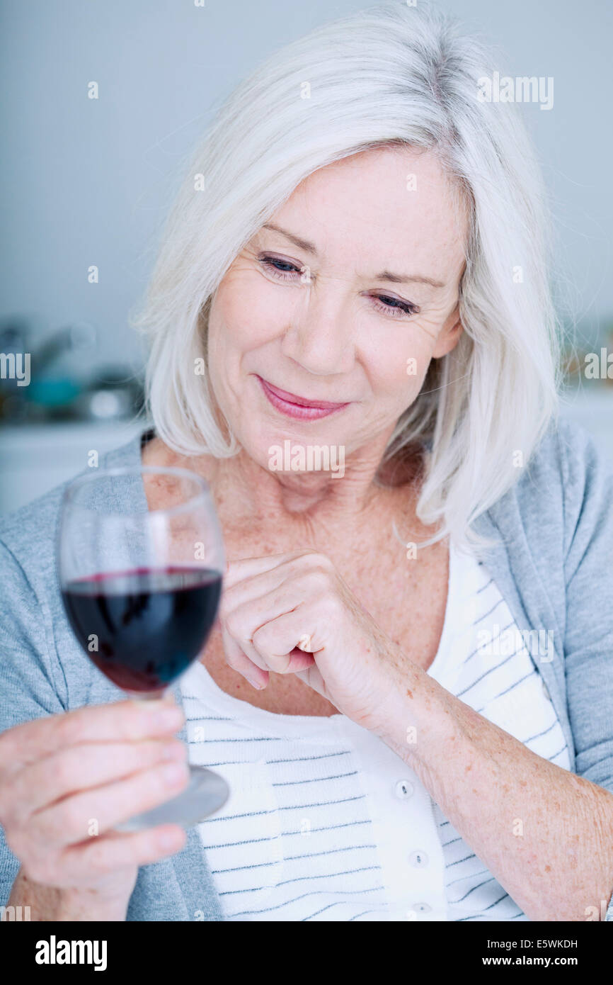 Elderly person drinking Stock Photo