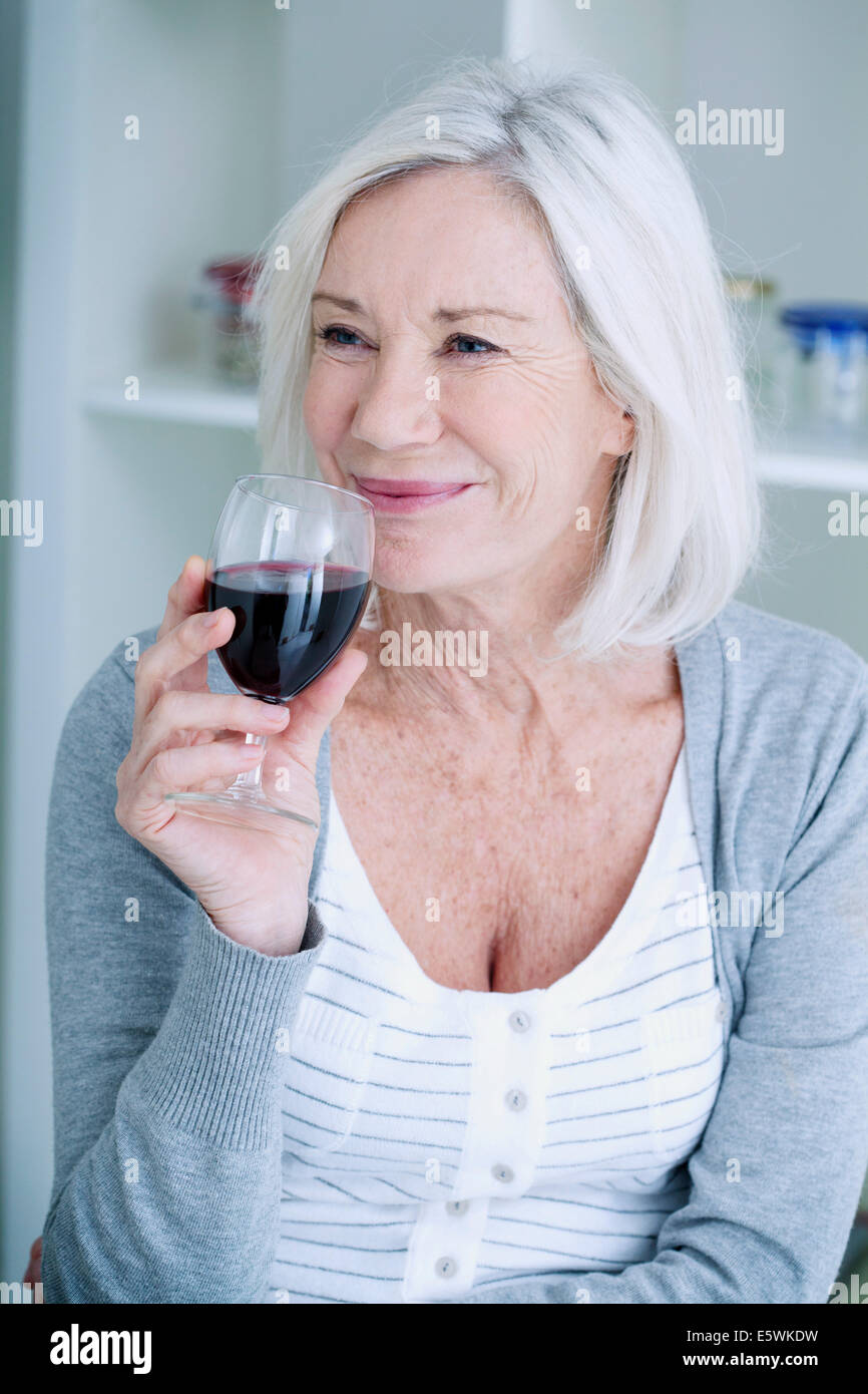 Elderly person drinking Stock Photo - Alamy