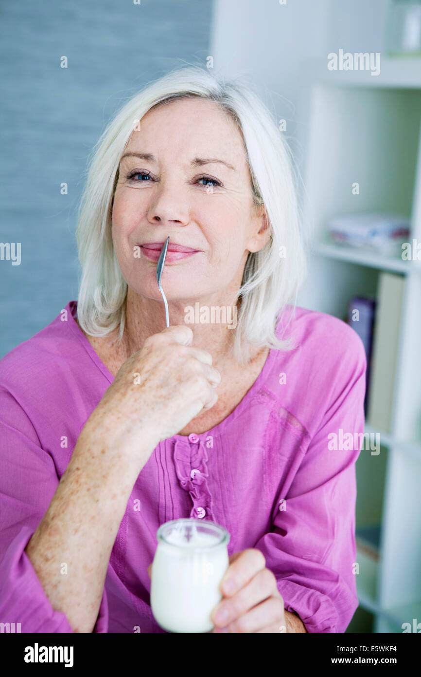 Elderly person, dairy product Stock Photo