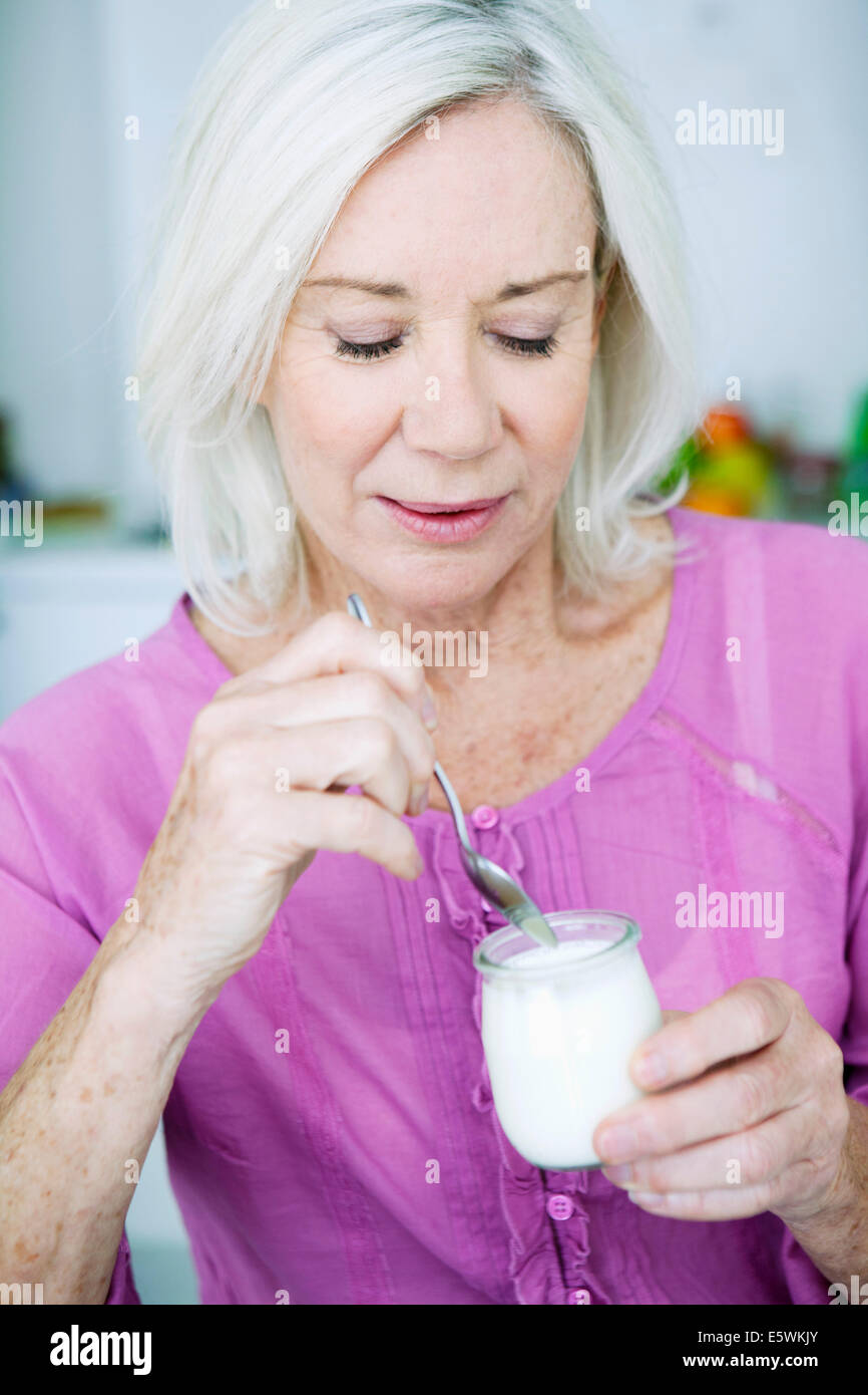 Elderly person, dairy product Stock Photo