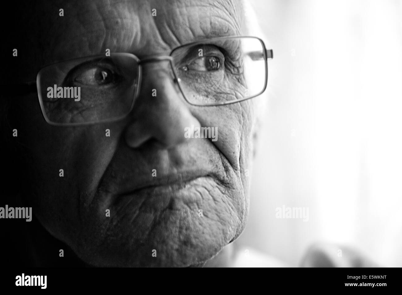 Elderly person indoors Stock Photo