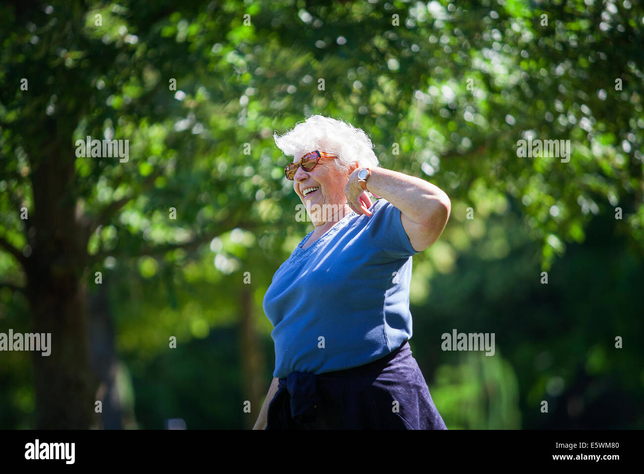 Elderly person practising a sport Stock Photo