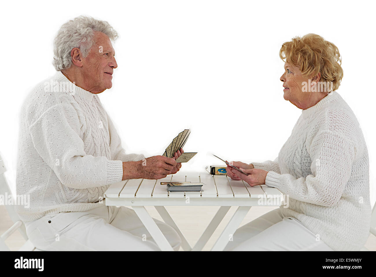 ELDERLY PEOPLE PLAYING CARDS Stock Photo Alamy