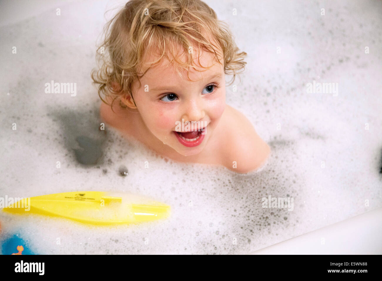 Child taking a bath Stock Photo Alamy