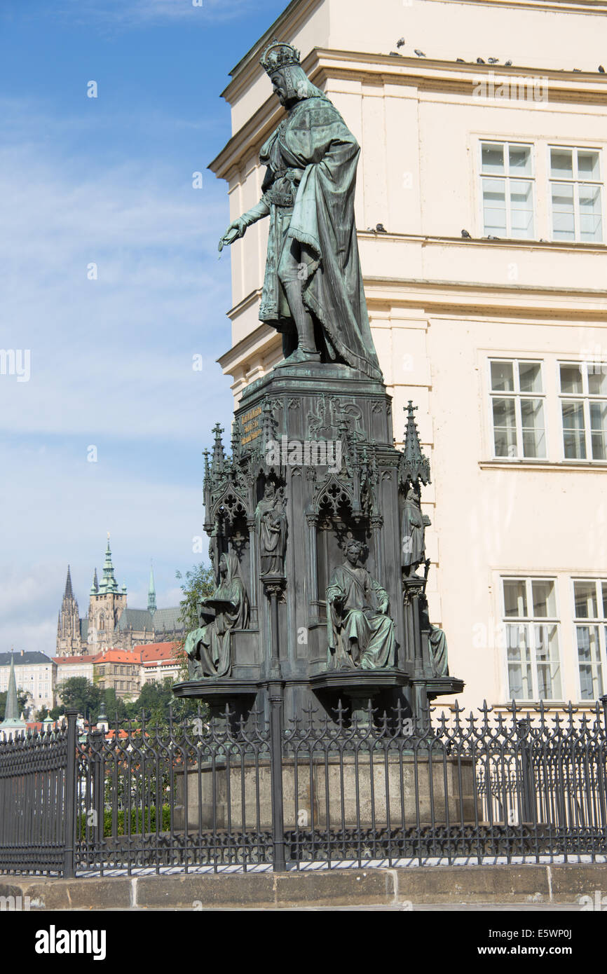 Statue by Charles Bridge tower Prague Czech Republic Stock Photo