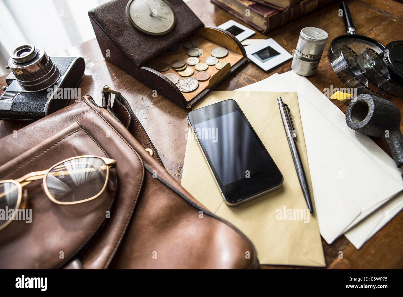 Still life of group of vintage objects with smartphone Stock Photo