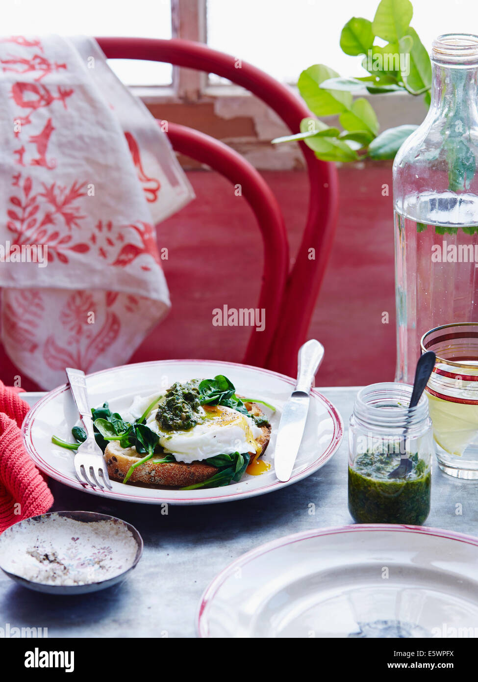 Poached eggs with avocado salsa verde Stock Photo Alamy