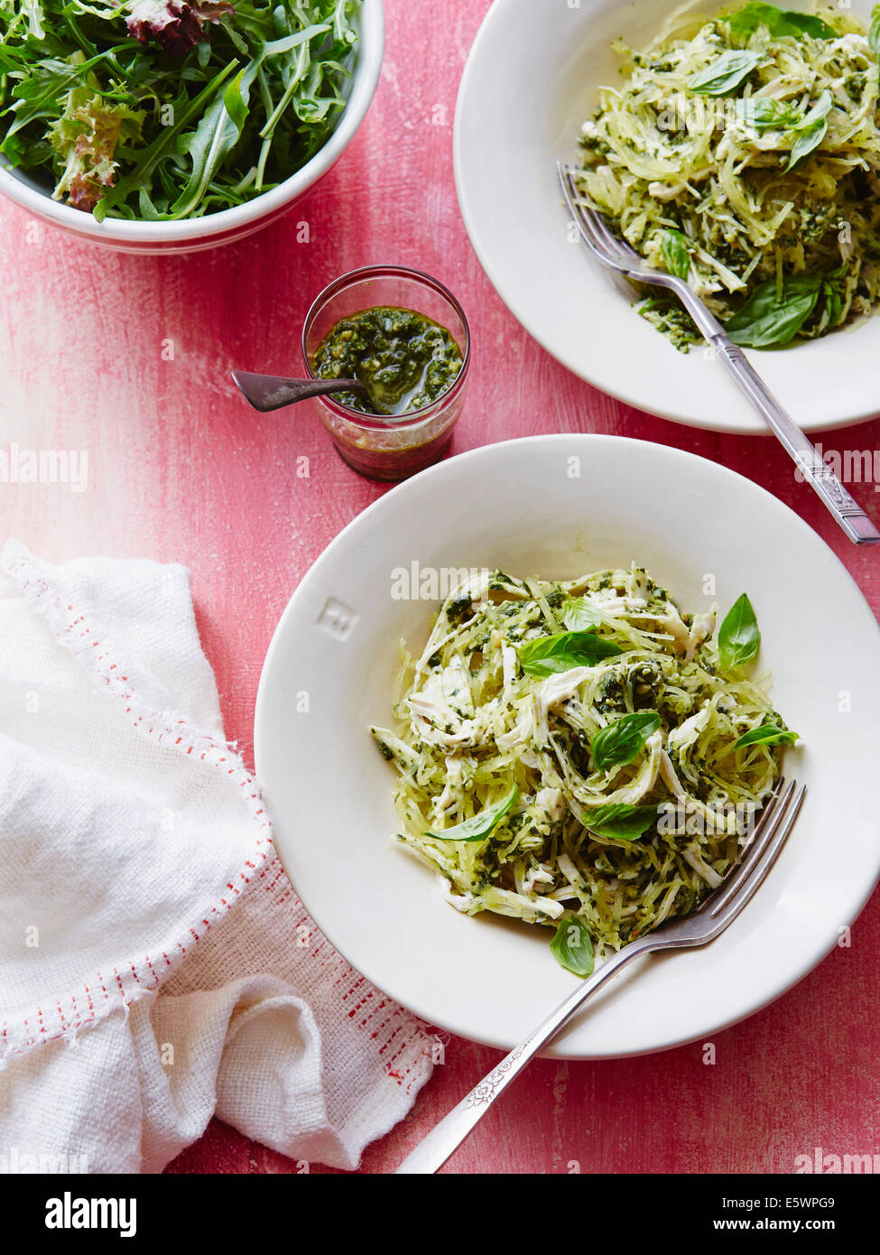 Spaghetti, pumpkin and chicken with pesto Stock Photo