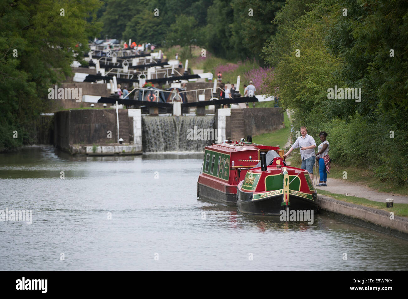 Narrowboats at Hatton Locks on the Grand Union canal. Hatton, Warwickshire, England Stock Photo