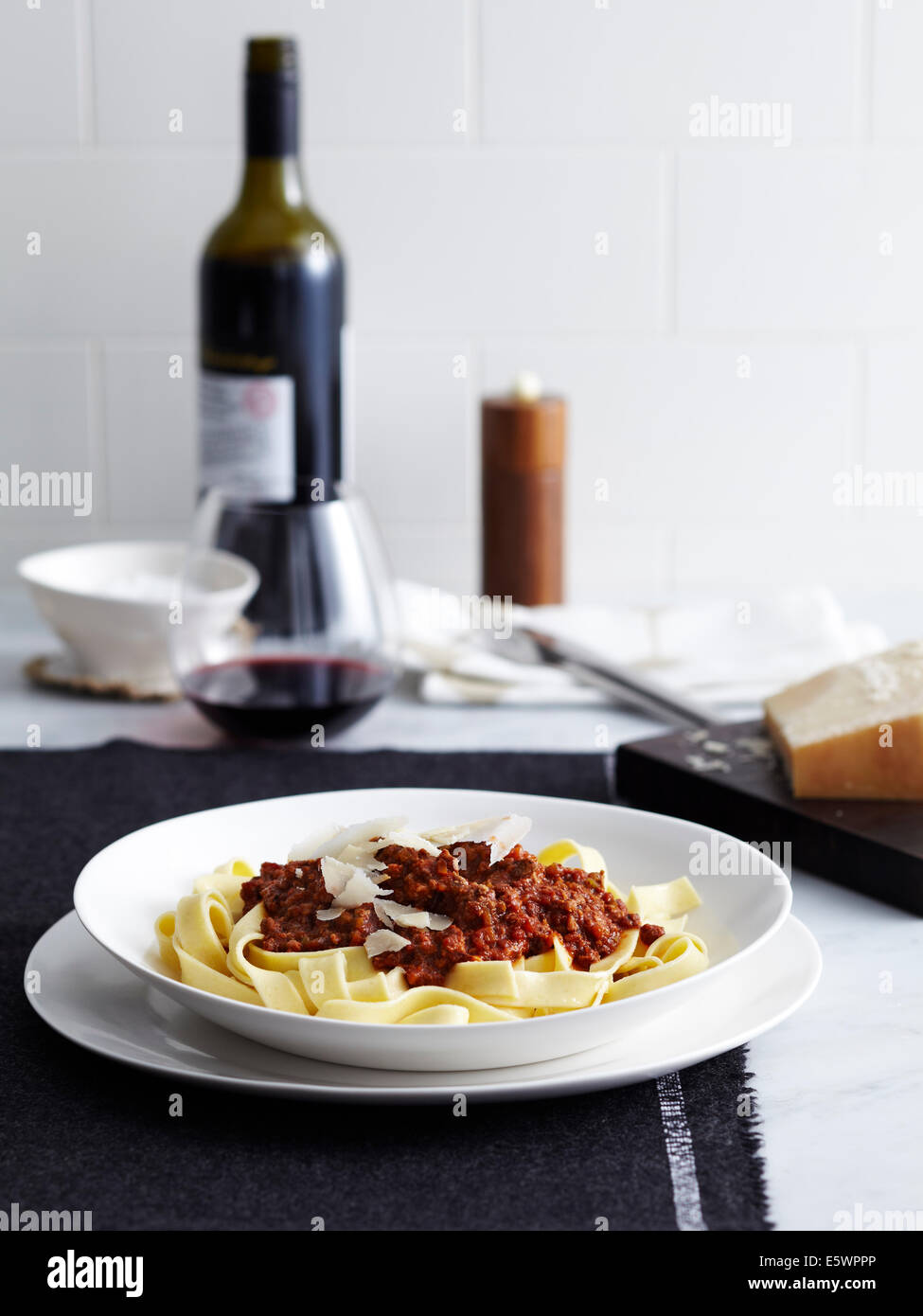 Bolognese ragu with tagliatelle and red wine Stock Photo