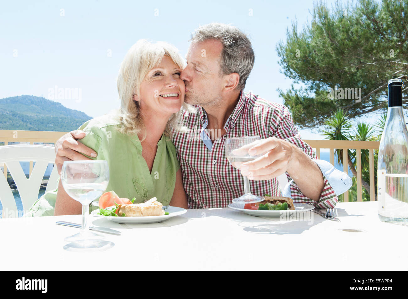 Couple celebrating on holiday, Mallorca, Spain Stock Photo