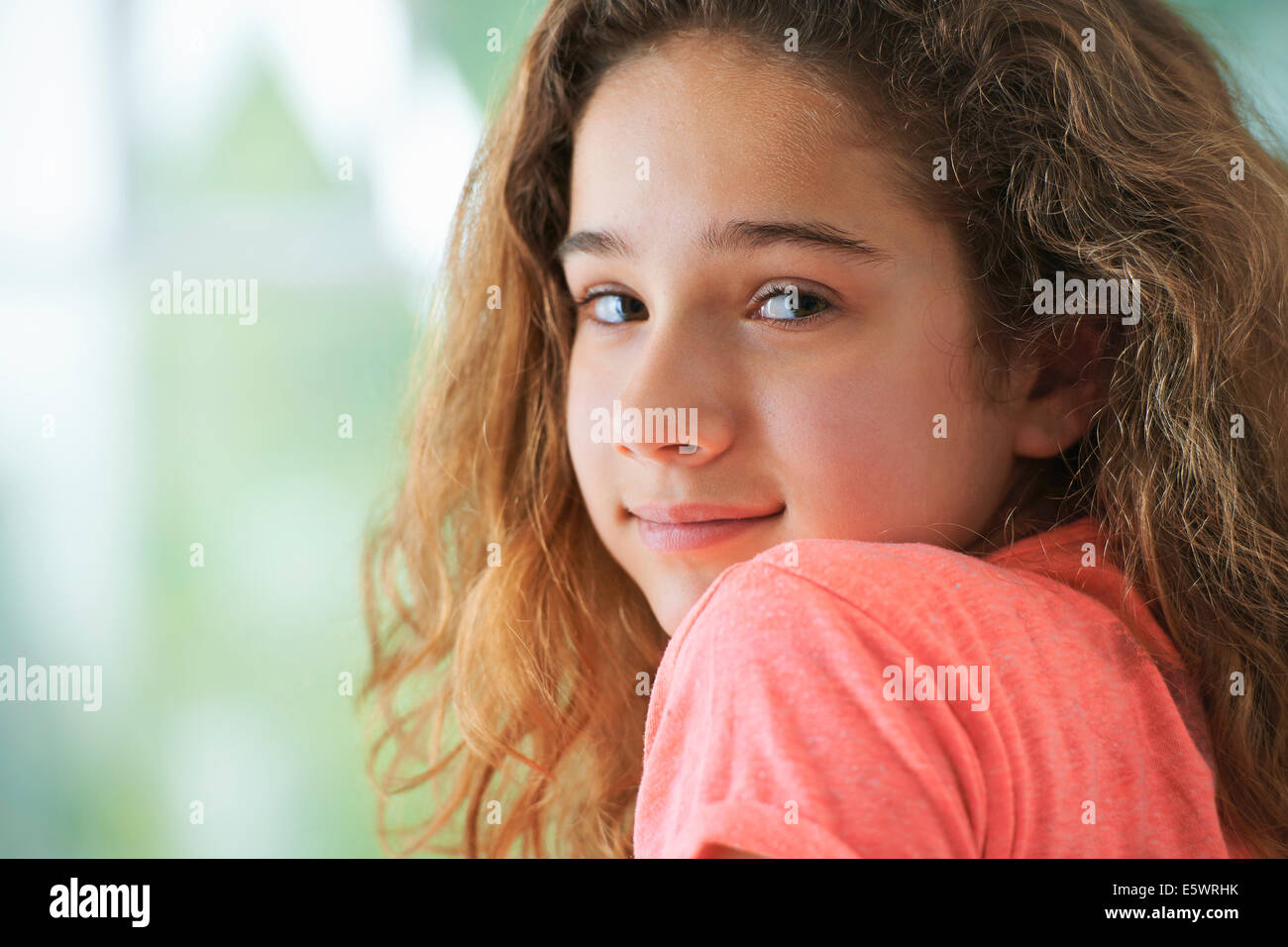 Young girl with brown hair ,smiling, portrait Stock Photo - Alamy