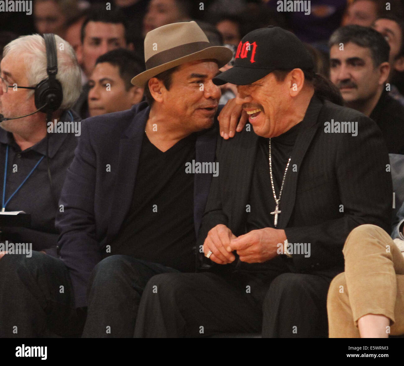 Friday January 31 2014; Celebs out at the Lakers game. Charlotte Bobcats Pacers defeated the Los Angeles Lakers by the final score of 110-100 at Staples Center in Los Angeles CA Featuring: George Lopez,Danny Trejo Where: Los Angeles California United Stat Stock Photo