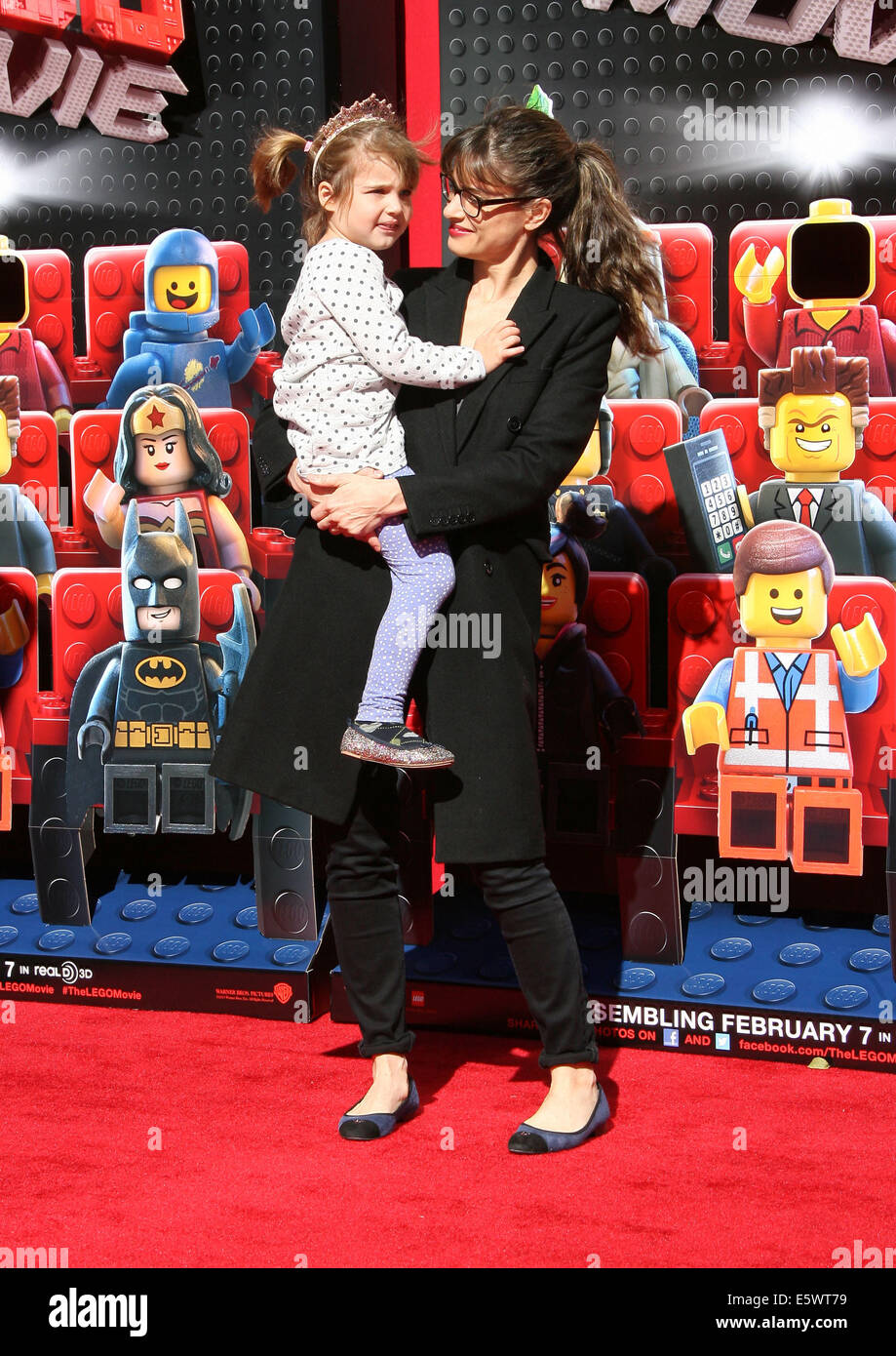 The Lego Movie Premiere held at The Regency Village Theatre in Los Angeles  CA. 1-2-2014 Featuring: Amanda Peet with daughter Where: Los Angeles  California United States When: 01 Feb 2014 Stock Photo - Alamy