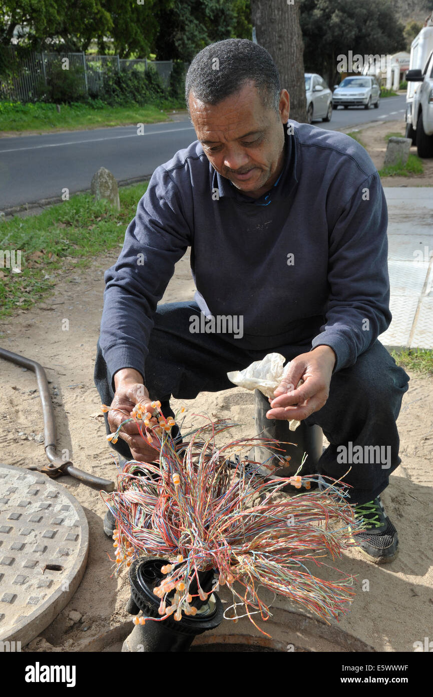 Telcom work upgrading cable system Stock Photo