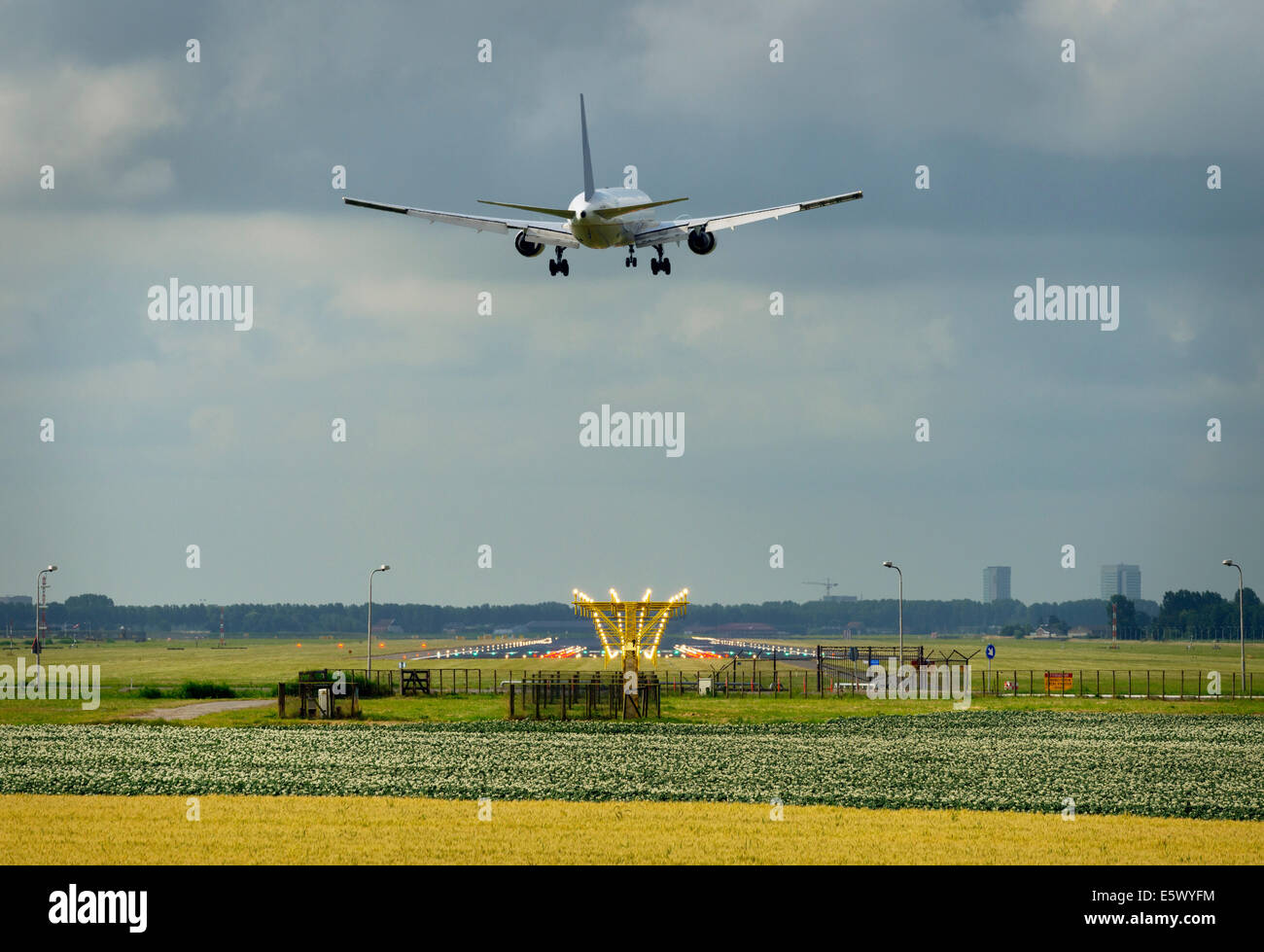 An aeroplane approaching Schiphol Amsterdam Airport Stock Photo