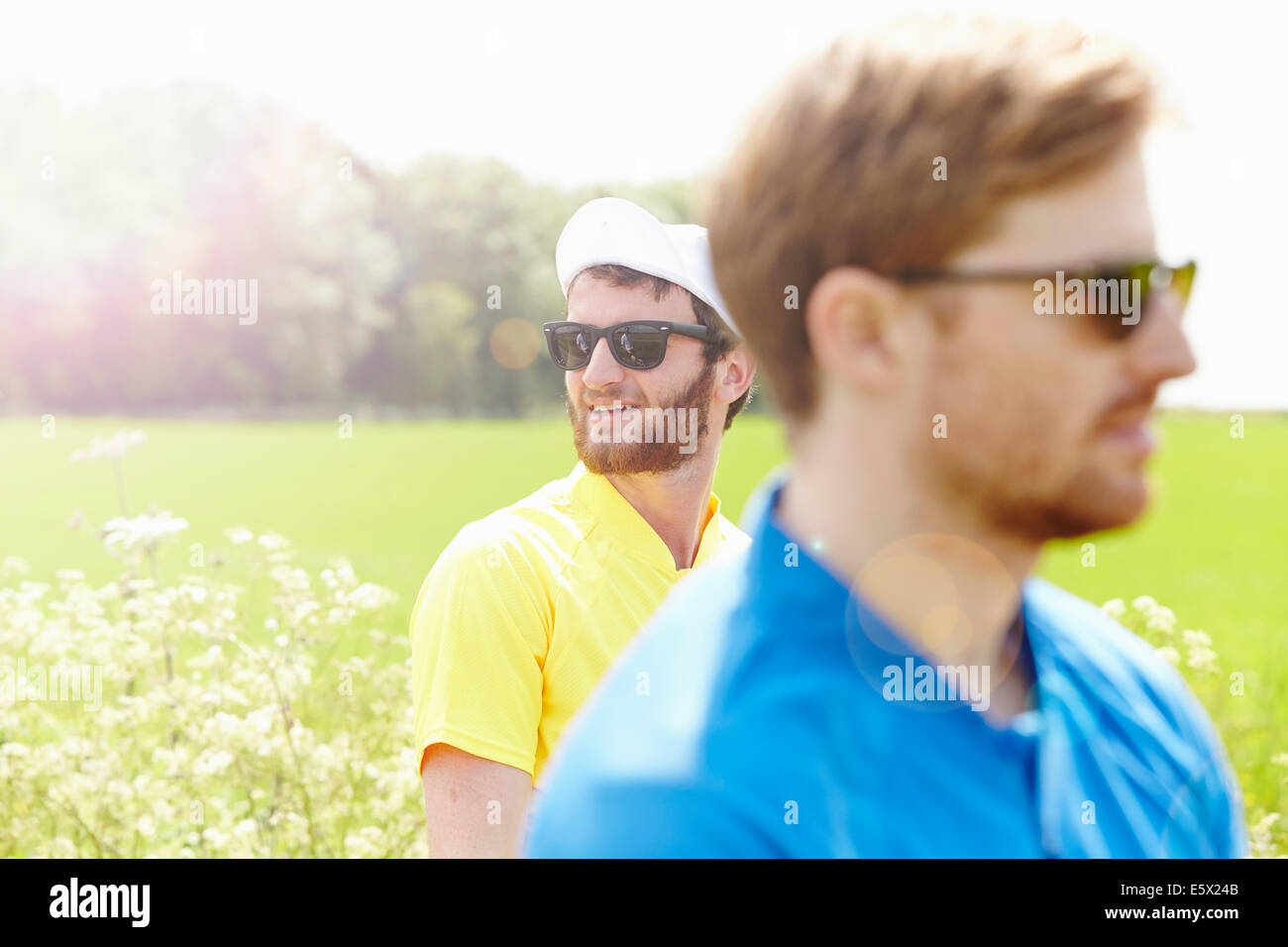 Cyclists wearing biking cap and sunglasses Stock Photo