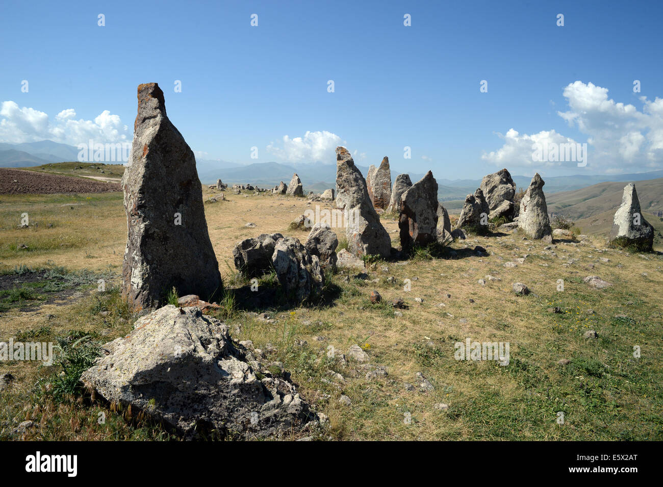 Sisian, Armenia. 27th June, 2014. Megaliths are seen at the prehistoric archaeological site Zorats Karer near Sisian, Armenia, 27 June 2014. The site served as a necropolis from the Middle Bronze Age to the Iron Age. Photo: Jens Kalaene -NO WIRE SERVICE-/dpa/Alamy Live News Stock Photo
